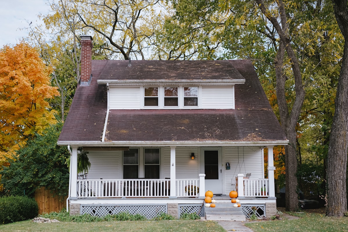 Philadelphia rowhome exterior with independent appraiser reviewing a report before listing